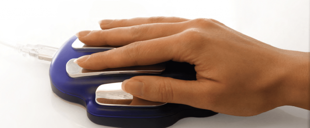 hand placed on the cradle of Zyto biofeedback